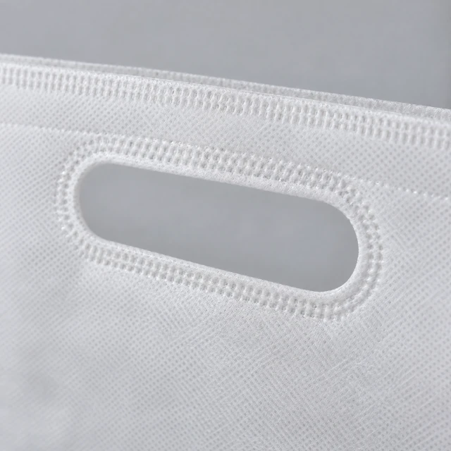 Close-up: sealed handle hole on a non woven bag